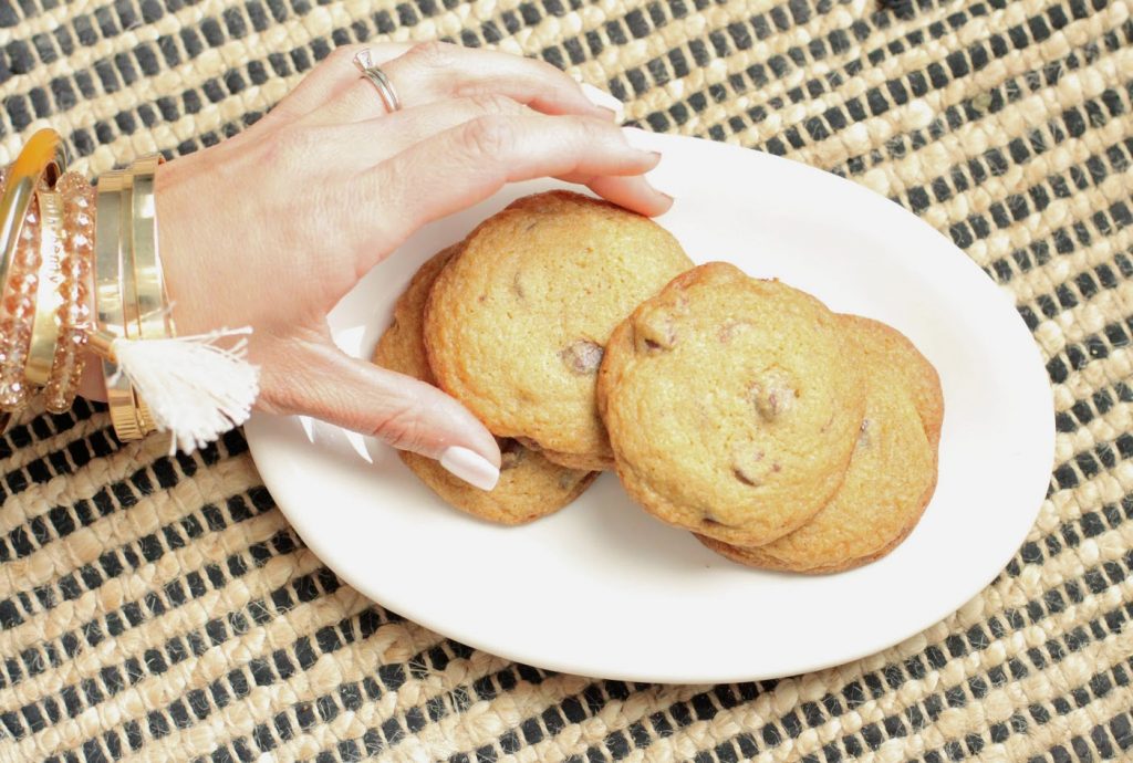 Find the secret to making amazing chocolate chip cookies right here! This delicious and easy recipe will have your friends saying, THOSE ARE THE BEST CHOCOLATE CHIP COOKIES I'VE EVER HAD! Promise! Recipe, tips, and material suggestions all included to make this American classic today!