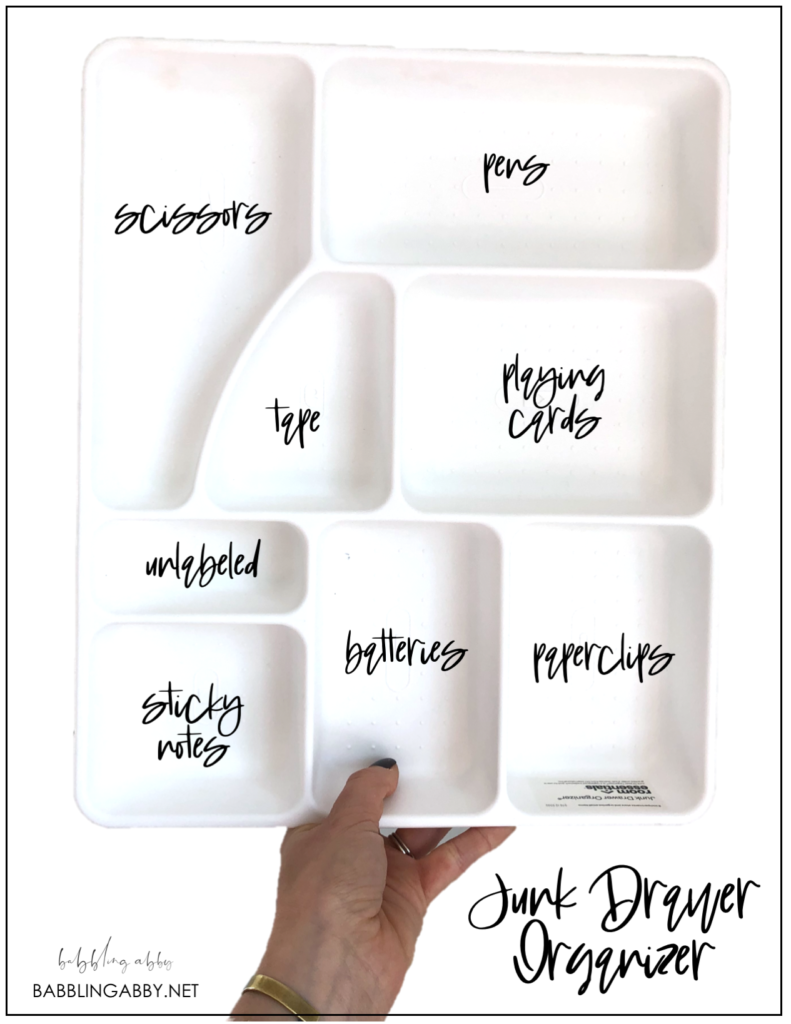 Need to get a handle on junk drawer organization? This post is for you! I've used multiple containers and trays and think I have a handle on what works best depending on the size and content of your drawer. A quick project with a big impact, organizing your junk drawer will help declutter your life and bring some order to the chaos of your drawers! #junkdrawer #organization #organize #springclean #drawerorganizer #declutter #clean #drawers #quickproject #babblingabby babblingabby.net