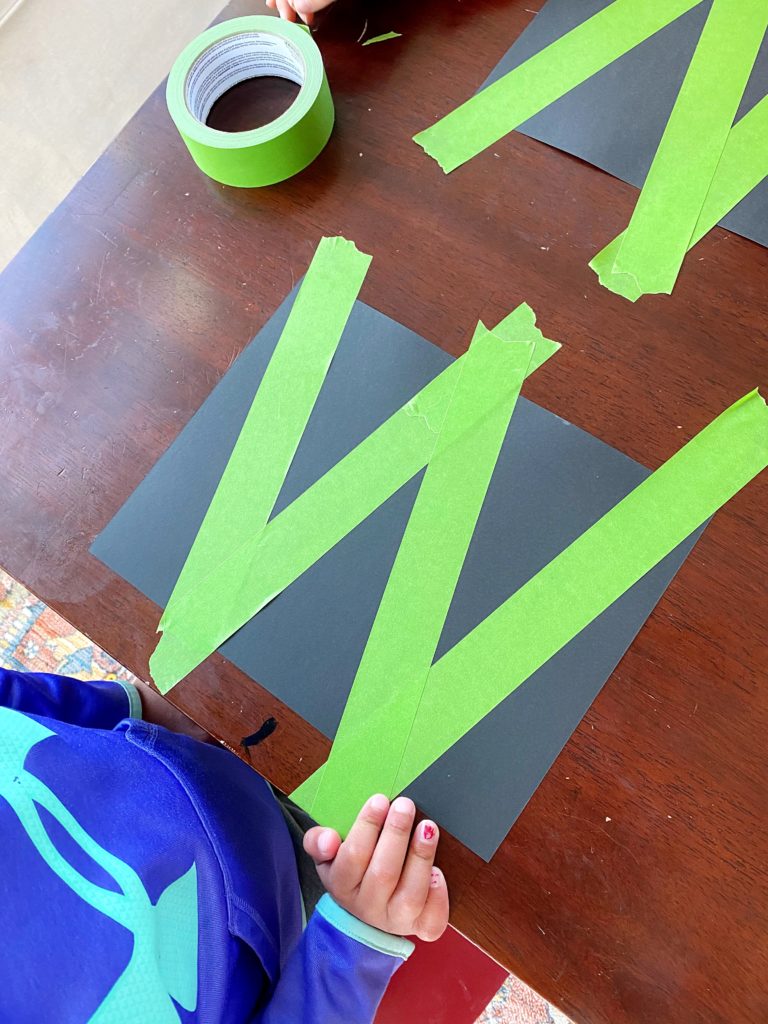For a chalk art project (Letter W): First, tape off the letter.