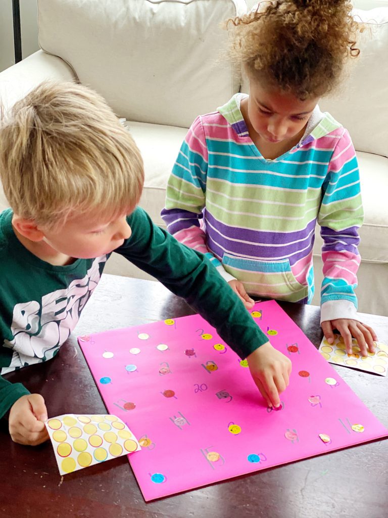 A fast and easy number recognition activity using poster-sized paper, a marker, and stickers.