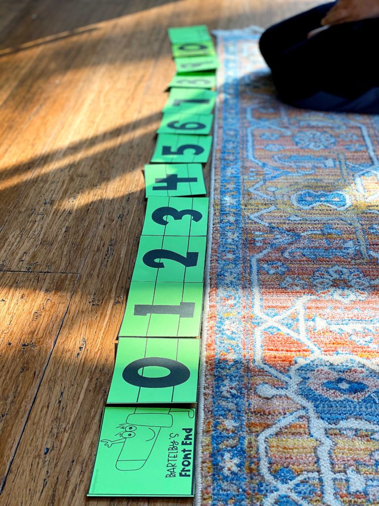 Printable dog-themed number line activity to accompany The Very Very Very Long Dog book.