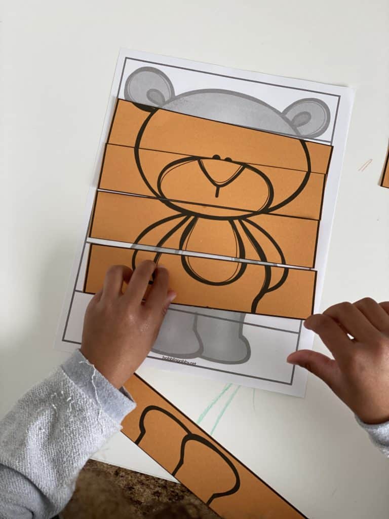 A simple strip puzzle to use with the children's picture book, Big Smelly Bear.